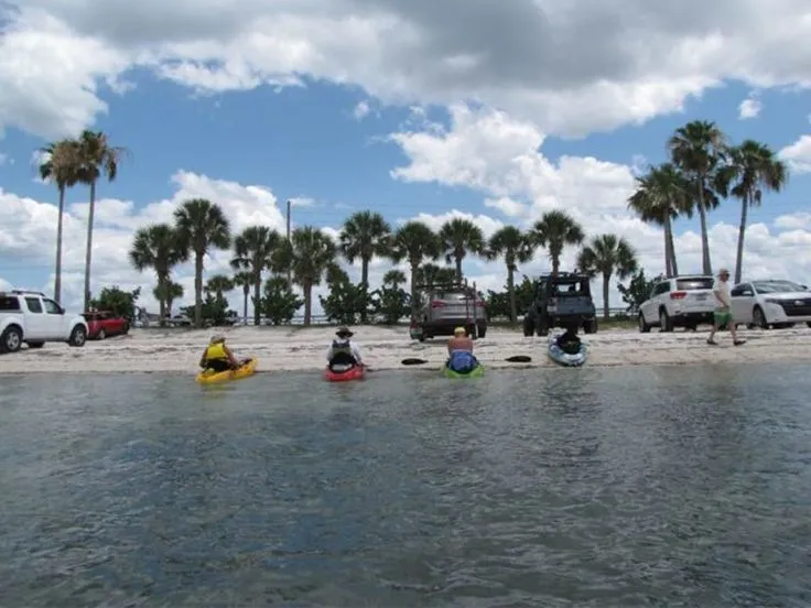 1290 couple kayaking sunset